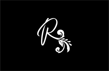 Letter R initial flourishes flower ornament logo