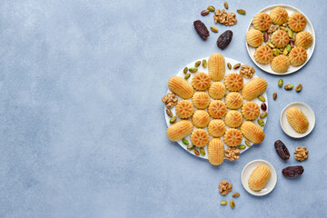 Arabic sweets. Traditional eid semolina maamoul or mamoul cookies with dates , walnuts and...