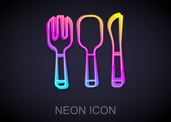 Glowing neon line Fork, spoon and knife icon isolated on black background. Cooking utensil. Cutlery sign. Vector