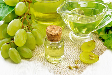 Oil grape in vial on board