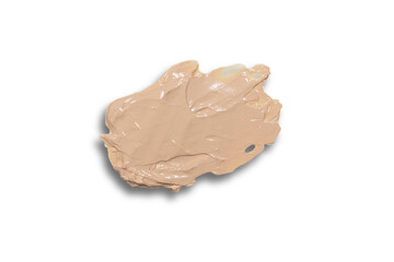 A smear of makeup foundation isolated on a white background. Swatch, texture