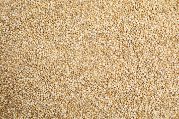 Heap of white quinoa as background, top view. Veggie seeds