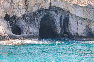 Large cave washed by the sea in a rock in Cyprus
