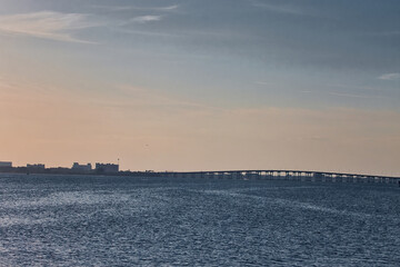 Bird watching in at the Melbourne beach pier in Florida at sunset on the Indian river
