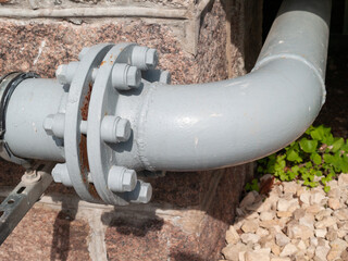 grey gas pipe connector system close up.