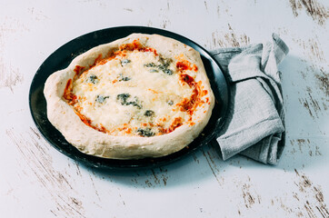 Freshly made homemade four cheese pizza. Italian food