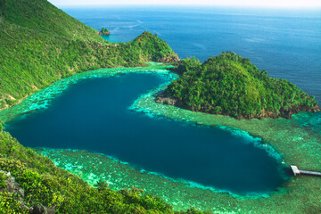 Karawapop, a heart-shaped lagoon in the cluster of West Papua island, Raja Ampat Indonesia	 - obrazy, fototapety, plakaty