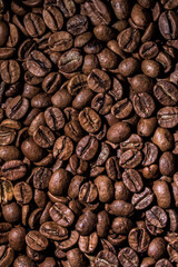 Group of brown colored coffee beans above vantage point photography, macro photography