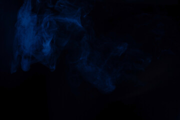 Blue and pink steam on a black background.