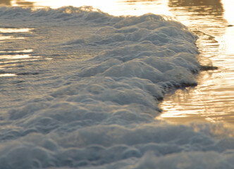 Foam close up on the beach