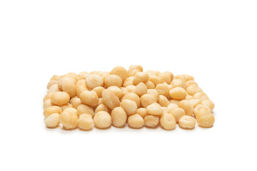 Macadamia nuts isolated on white background.
