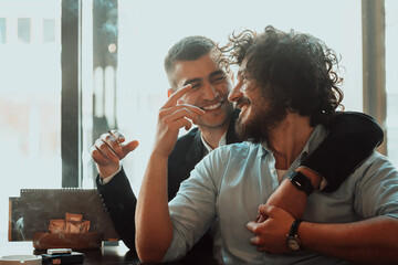 Portrait of multiethnic diverse gay LGBT romantic male couple embracing and showing their love