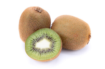 Two whole kiwi and half cut on a white background, isolated