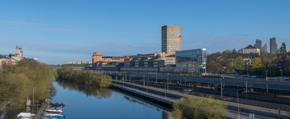 The canal Karlbergs kanalen in Stockholm with residential and office buildings a sunny spring morning