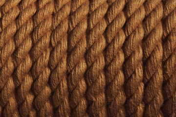 Closeup rope background. Low light brown rope texture. Horizontal gradient pattern.