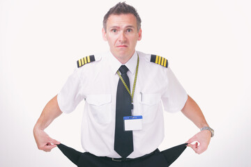 Airline captain pilot showing his empty pockets