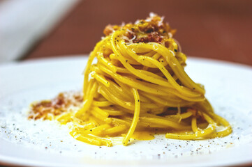 Traditional italian carbonara pasta with guanciale eggs and pecorino cheese (ph. Archivio...
