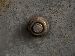 Rusted bolt and nut on a rusted iron surface close-up macro photography. Selective focus