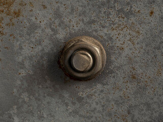 Rusted bolt and nut on a rusted iron surface close-up macro photography. Selective focus