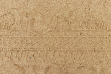 Sand with tire tracks