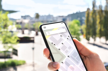Map app in mobile phone to search location or navigate to destination in city. Place marker and pointer icon. Online GPS guide in smartphone. Geo satellite technology for tracking route and direction.