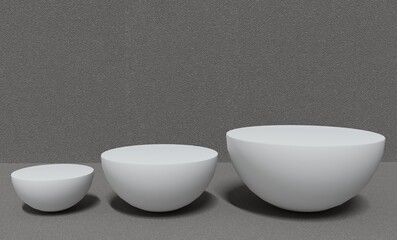 Three white cylinder podium