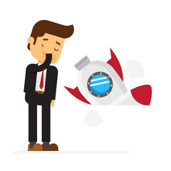 Businessman with rocket crashed