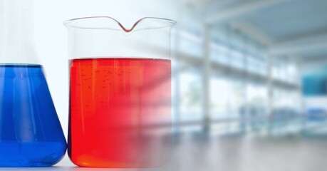 Composition of flask and beaker in lab with motion blur