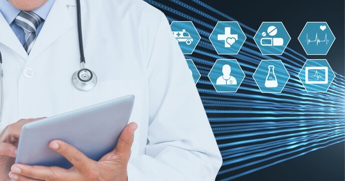 Composition of male doctor using virtual screen with medical icons on blue background