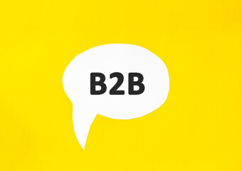 Text B2B speech bubble isolated on the yellow background. Business concept. Business to business