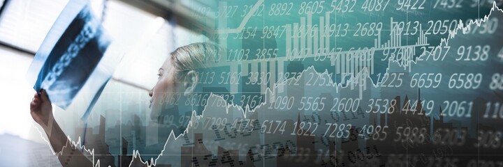 Woman doctor lokking at x-ray radio in hospital