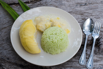 Thai sweet sticky rice with Durian.dessert popular in Thailand.Sticky rice made from pandan leaves