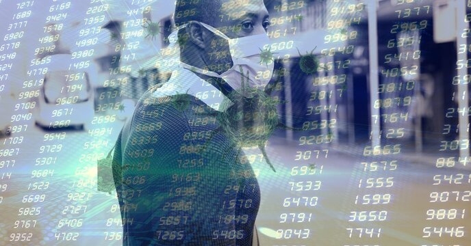 Composition of data processing and covid 19 cell over man wearing face mask in city - Powered by Adobe