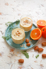Smoothie with blood orange carrot leaves oats and ginger almonds (ph. Marianna Franchi)