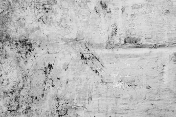 Texture of a concrete wall with cracks and scratches which can be used as a background