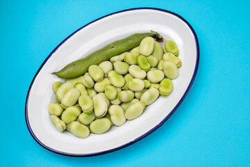 green beans in white dish