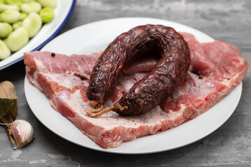 ingredients for portuguese dish green beans, smoked sausage and meat