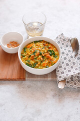 Risotto with saffron carrot onions and rocket salad (ph. Marianna Franchi)