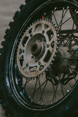 Vertical shot of a loose bicycle wheel in a workshop