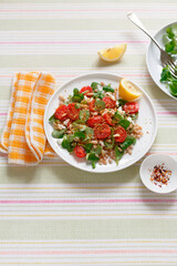 Cereal salad with marinated dates almond feta and pine nuts (ph. Marianna Franchi)