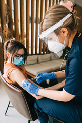 Caucasian woman patient getting vaccinated against coronavirus receiving covid vaccine....