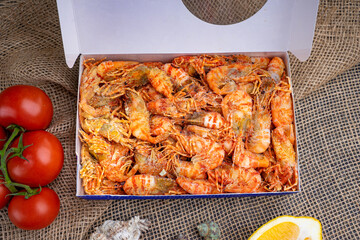 Fresh Greenland prawns in a box. A tasty delicacy.