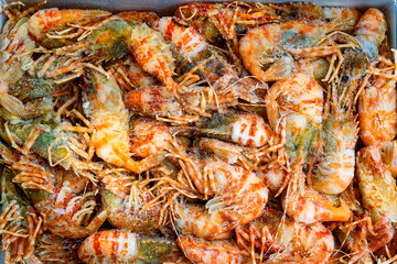 Fresh frozen Greenland prawns in a box. 