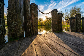 old wooden pier with chain