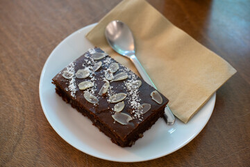 Chocolate brownie cake ,Diary product over white plate