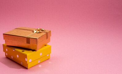gift boxes on pink background