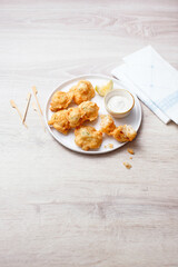 Cod pancakes with lemon and sauce (ph. Marianna Franchi)