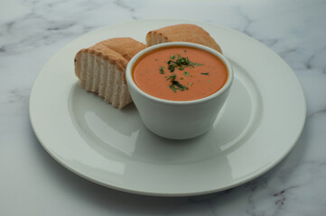 Bowl of tomato soup and bread