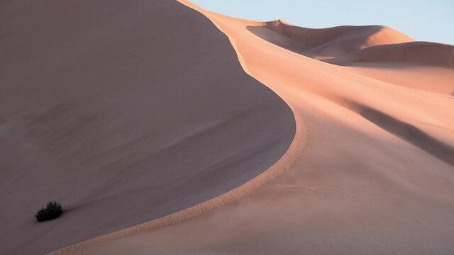 Time lapse at sunrise on the sand dunes of the Rub al Khali desert The Empty Quarter, Oman, Middle East