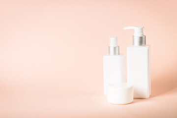 Natural cosmetic product. Spa background. Scincare product - gel, tonic, soap and cream at pastel background.